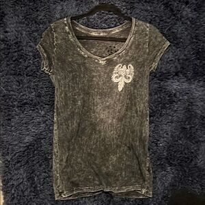 Super cute Black distressed v neck T-shirt from Buckle
Large angel wings in back